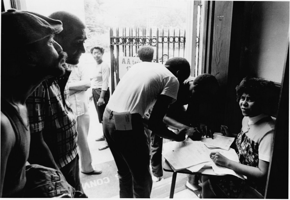 Eva's Kitchen first Kitchen Director Eva Hernandez, SMIC,  with guests, 1982, in Paterson.